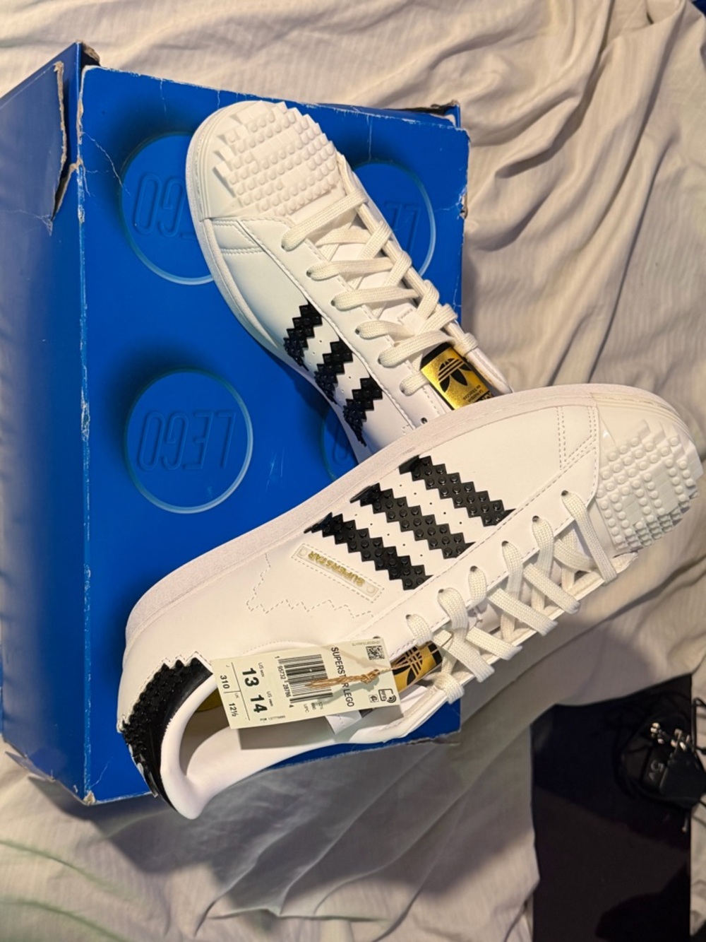 Mint condition Lego Men's White superstar shoes and Lego model kit. Last 3 pics.